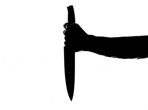 Silueta de mano con cuchillo